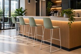 Frezza Yo Plastic bar stools in green at a modern office bar
