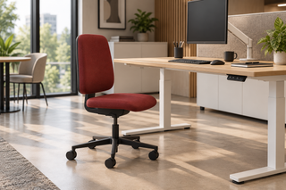 Rovo Eco 1060 S6 office chair in burgundy at a modern workstation