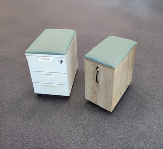 Buronomic Comfort mobile pedestals in white and wood with green seat cushion