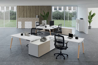 Buronomic Dialogue staggered individual desks on Bbox console in solid wood and white
