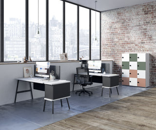 Sfeerbeeld van een Buronomic Locker Eko kast met twaalf vakken in wit, groen, perzik en salie in een loft